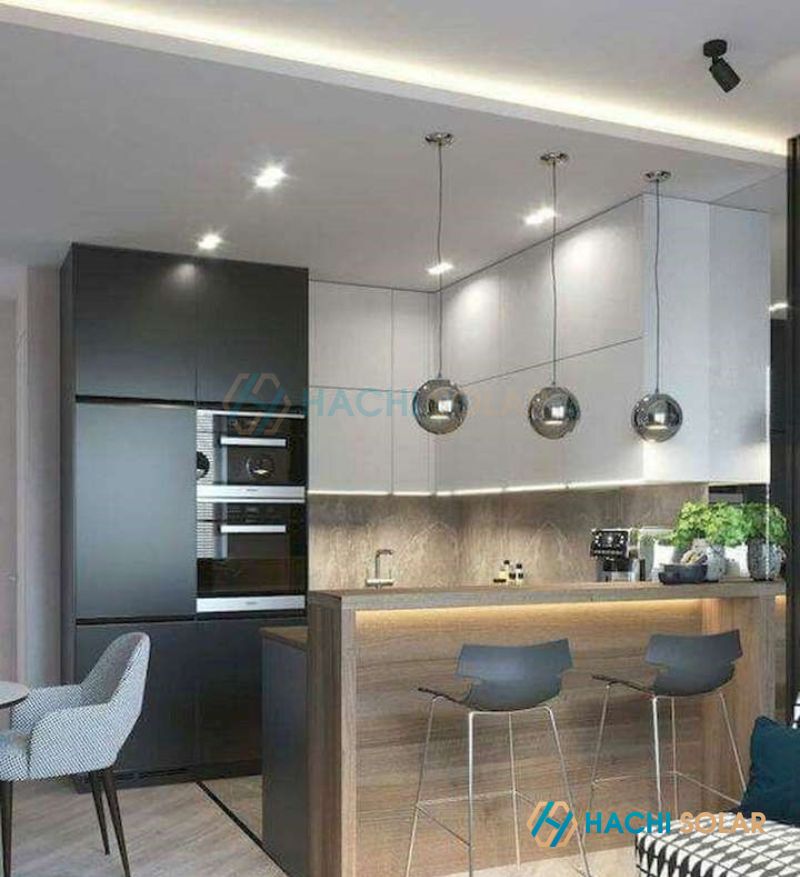 Mẫu quầy bar phòng bếp có thiết kế ánh sáng đơn giản nhưng ấm áp