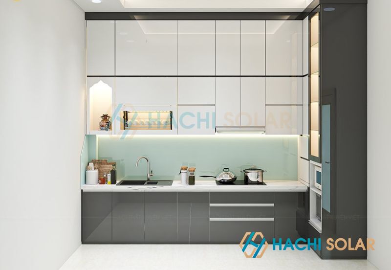 Mẫu tủ bếp màu xám trắng phối màu với ghi sáng đem lại cảm giác dễ chịu cho không gian bếp